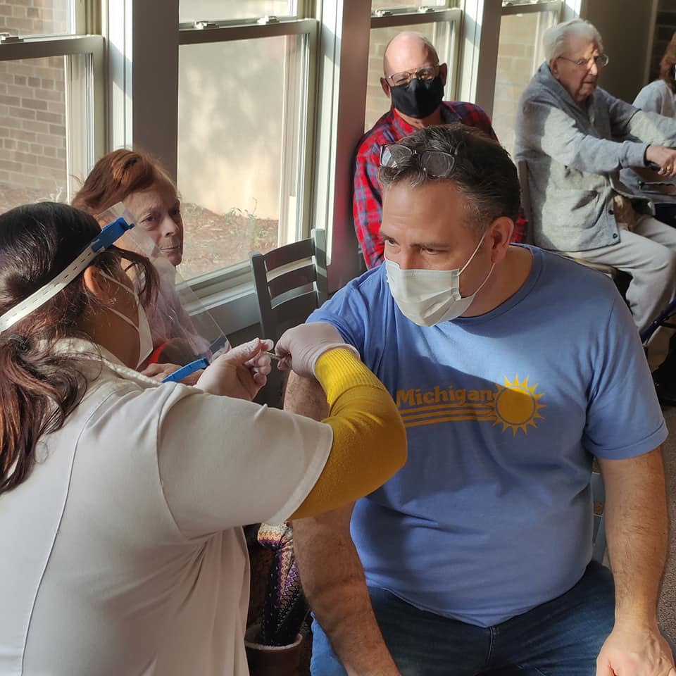michael piagentini receiving covid 19 vaccine