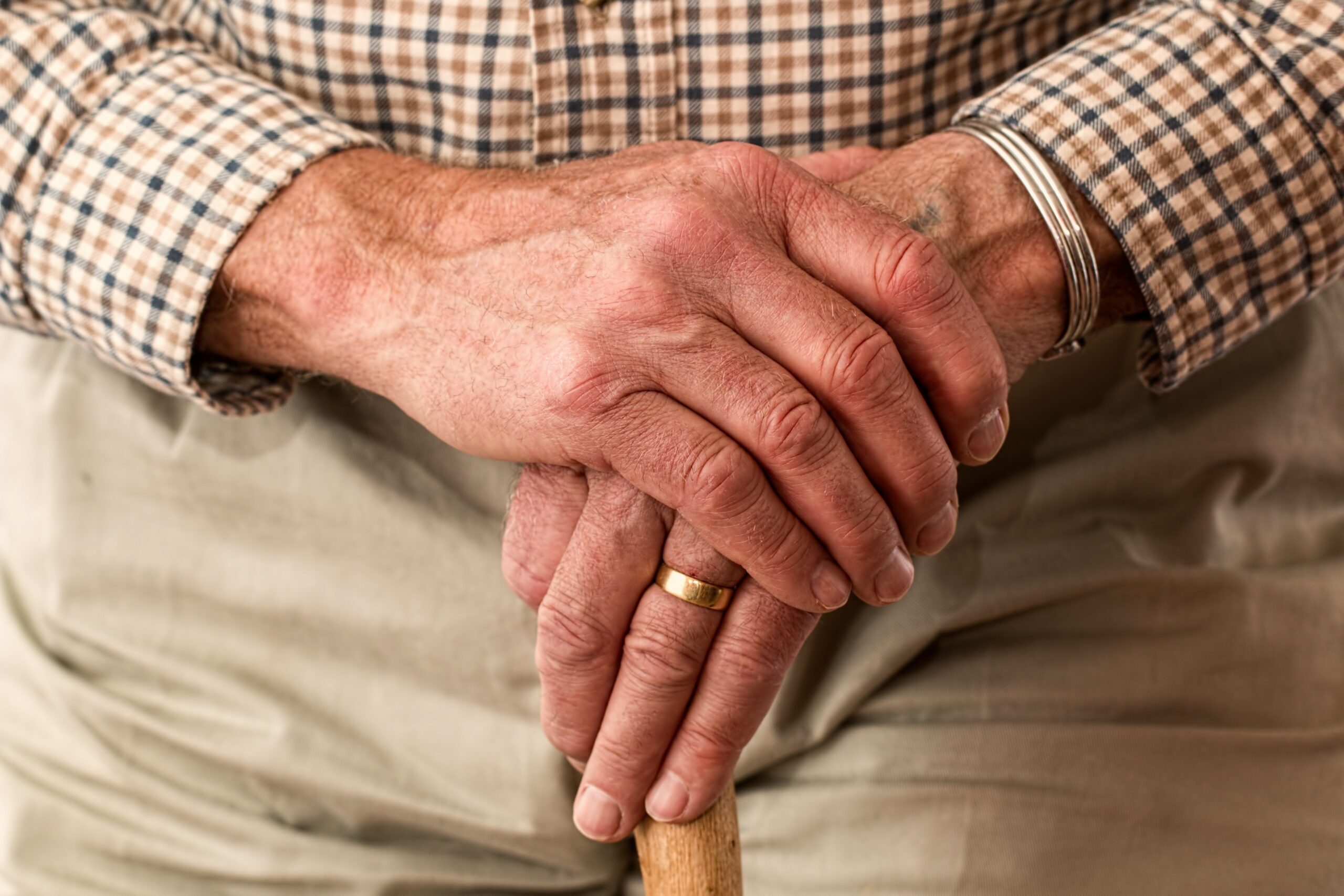 Elderly Man Holding Cane