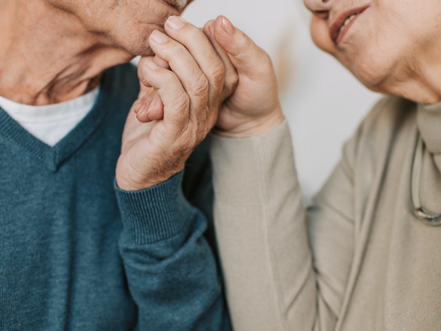 Elderly Couple Holding Hnads